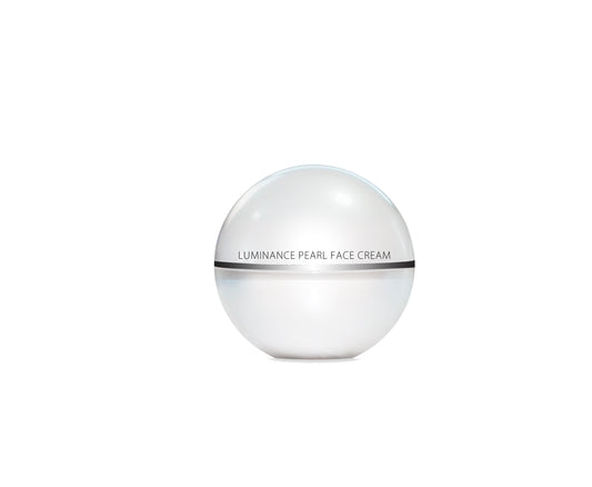 A jar of LUMINANCE PEARL FACE CREAM with a white and silver label, spherical in shape, against a white background.